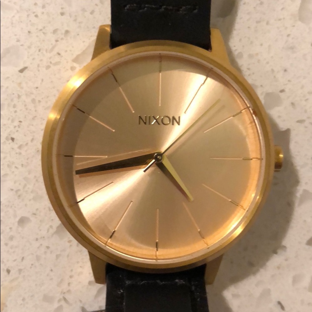 Women’s Nixon Leather Strap Watch.Plastic on back